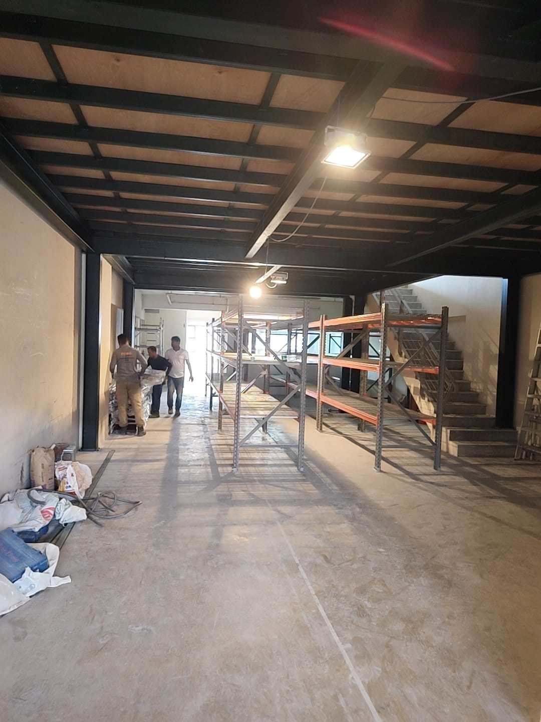 Long corridor view of the Frontier Industrial Building unit during the mezzanine construction works